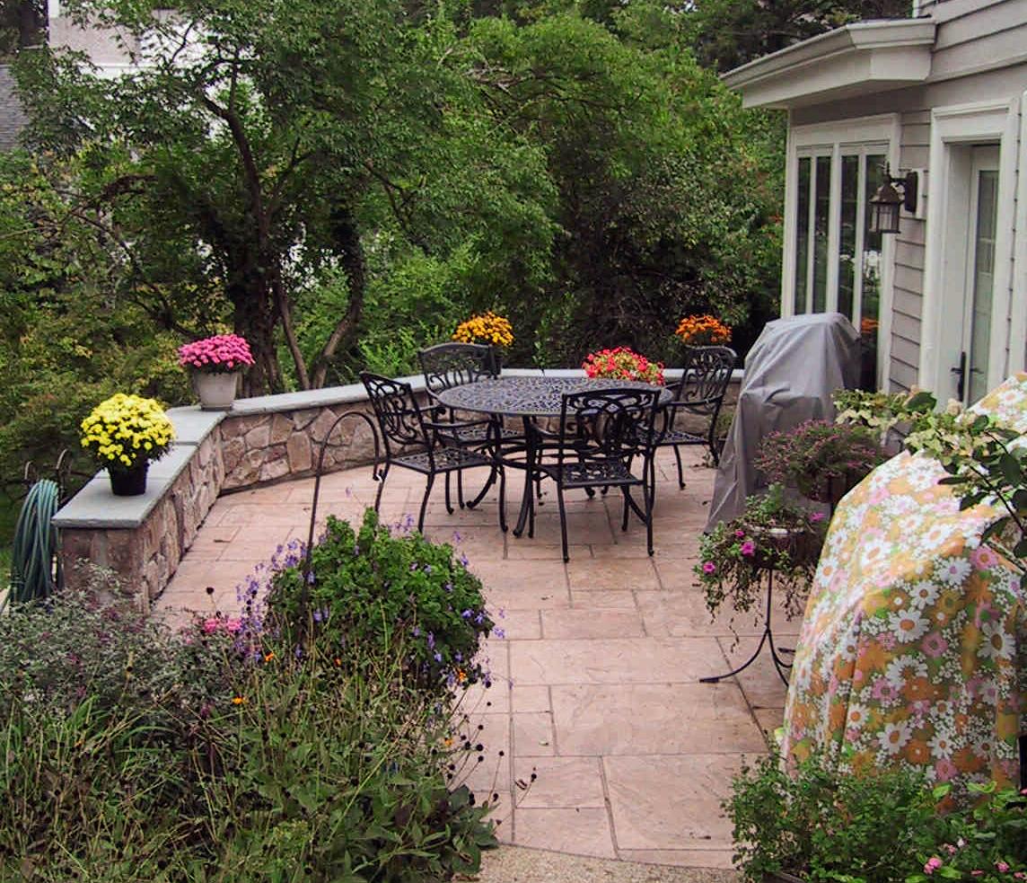 Patio addition with pavers and stone wall in Wyoming